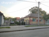 House and building land in the center of